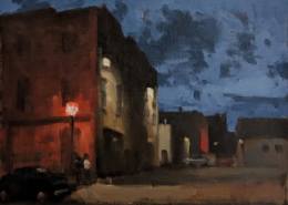 red warehouse building at night